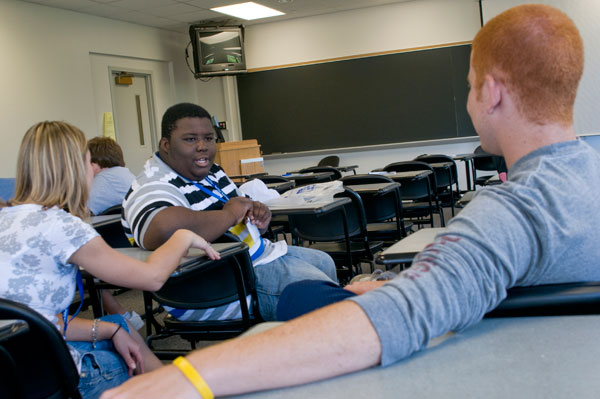 New students get to know one another prior to an informational program in an ACC classroom.