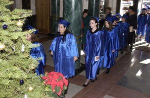 Soon-to-be-graduates enter the Community Arts Center for last December's commencement.