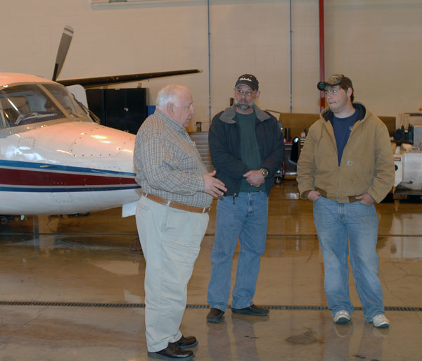 Jim E. Doebler, department head for aviation, shares information in the Lumley Aviation Center hangar.