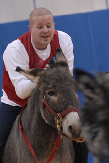 Entertainment with a purpose%3A Benefit Donkey Basketball offers fun for players - such as SGA President Jim Riedel - and fans alike.
