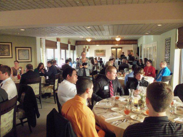 Amelia A. Seaton, dining room manager, walks restaurant patrons through the do's and don'ts of cultured cuisine.