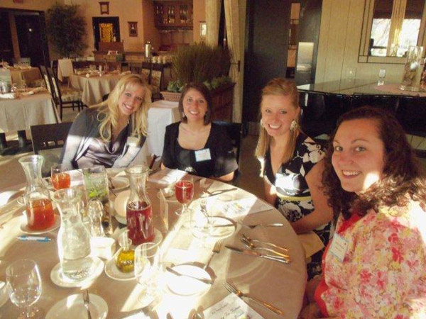 Dental hygiene students await another member of their dinner party.