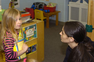 Early childhood education student Krystal A. Kappine, of Plymouth Meeting, interacts with a child during free-play time at the Children%E2%80%99s Learning Center at Penn College.