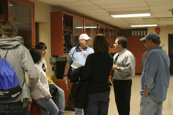 Jon W. Hart, instructor of building automation technologies/HVAC/electrical, answers questions in the Electrical Technologies Center.