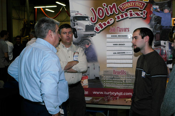 Turkey Hill representatives talk with a Natural Resources Management student about opportunities in the diesel field.