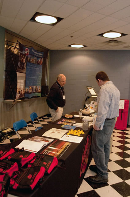 Career Fair giveaways fill the tables of Bechtel Power Corp., of Frederick, Md.