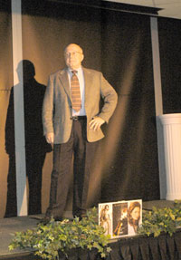 Lawrence W. Emery, counselor, models business attire.