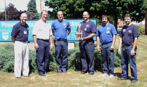 On hand for Thursday's presentation are, from left, Walter D. Nyman, director of General Services%3B William J. Martin, senior vice president%3B Patrick J. Kimble, custodian%3B Donald J. Luke, facilities supervisor%3B Jeff G. Rotoli, custodian%3B and Barry L. Loner, custodian. 