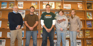 From left are Bruce Richards of Wagner Hardwoods, Cayuta, N.Y.%3B Forestry Club member Douglas J. Avellino%3B alumnus Derek P. Bailey %3B and club members Jessie E. Bordner and Abbalie L. Hutton.