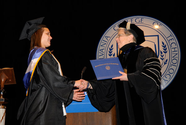 The final graduate of the Spring 2010 class, speaker Kathryn A. Foster, crosses the stage.
