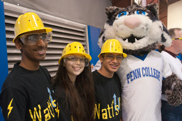 The Wildcat makes pals with members of Watts Up, a team from the Say Watt Robotics Club of Edison, N.J.
