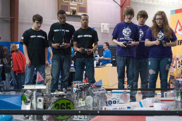Tech Heroes, of George Washington Carver High School of Engineering and Science in Philadelphia, team up with Robo Warriors during a qualifying match.