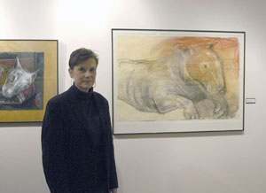 The artist, among her work in The Gallery at Penn College.