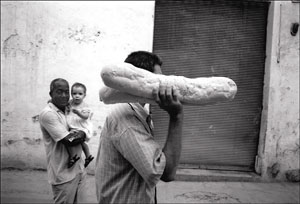 Rolfe Ross' works include this 8-inch-by-12-inch photo, entitled 'Breadman.'