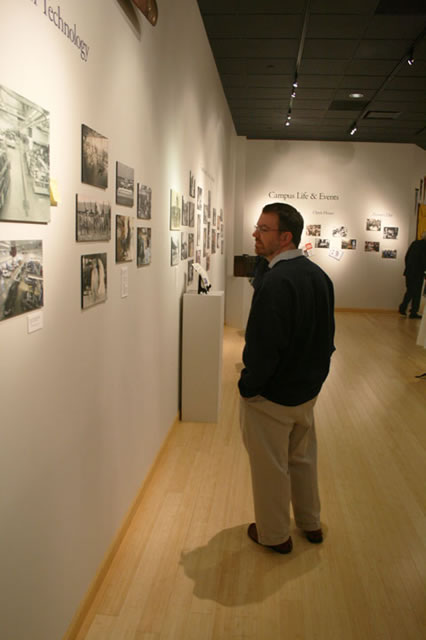 Ward W. Caldwell, special assistant to the president for student affairs, views the gallery exhibit.