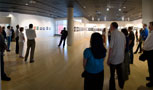 Joseph Loehr, associate professor of English/mass communications, offers gallery talk