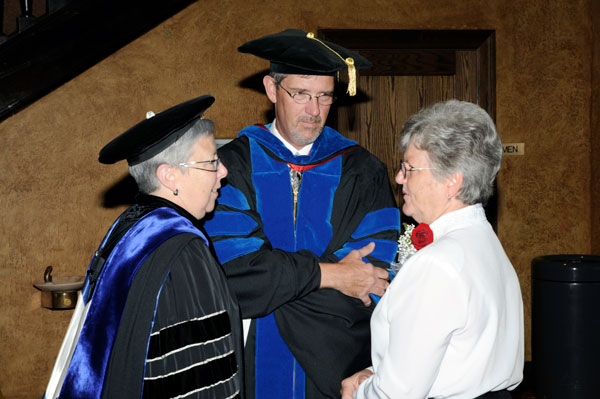 President Gilmour and Provost Starkey talk with Arts Center volunteer (and Penn College retiree) Bernadette Servey.