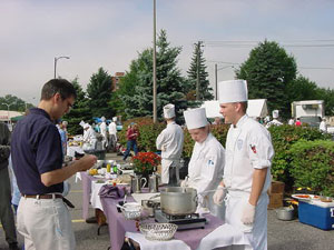 Frederick W. Becker, dean of hospitality%3B and catering students at the Williamsport Growers Market last fall.