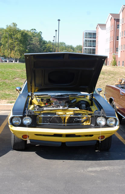 General Services maintenance supervisor Harry Rall entered this 1993 Dodge Challenger, shining in the Saturday sun.