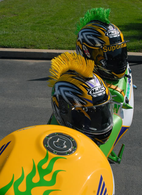 Neon helmets, with mohawks to match, adorn a 1996 Honda owned by Robert Eigenbrod, of Williamsport.