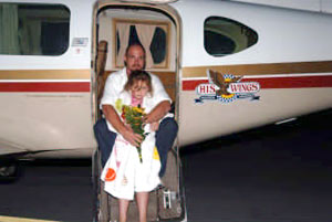 Rosealee LeDee, united with her father at the Altoona Airport.