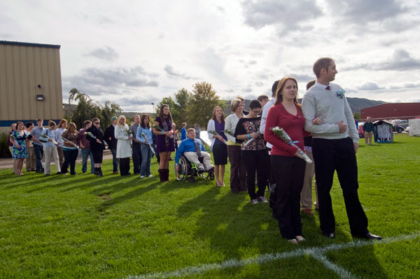 The Homecoming Court, 36 candidates representing 18 student organizations, line up for their procession Saturday.