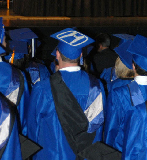 A graduate of the School of Transportation Technology's Honda PACT program wears his heart on his hat.
