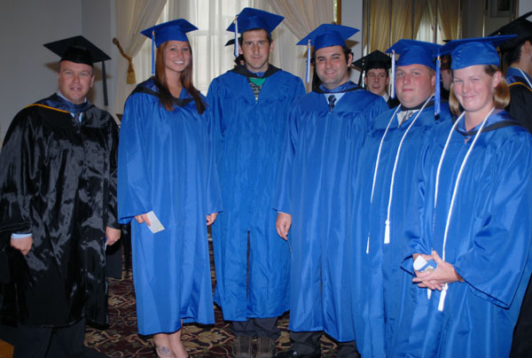Horticulture instructor Carl J. Bower with the major's five Saturday graduates