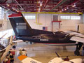 Dash-8 dwarfs other aircraft inside the Penn College hangar at the Williamsport Regional Airport