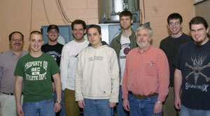 From left, Randall L. Moser, instructor of electronics and adviser to Penn College's student chapter of the Instrumentation, Systems, and Automation Society%3B student Eric A. Maschuck, Paxinos%3B student Matthew J. McKinney, Youngsville%3B student Phillip A. Dickey, Easton%3B student Jamison S. Hurt, Parkesburg%3B student Blake J. Waybright, Gettysburg%3B Perry R. Gotschal, assistant professor of electronics%3B student Kyle J. Wilson, Russell%3B and student Evan R. Deurer, Slatington.