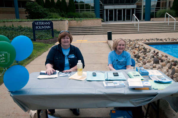 "Just Ask Me" team members, Patti J. Haefner, secretary to the senior vice president and director of alumni relations (left) and Lisette N. Ormsbee, director of the Madigan Library.