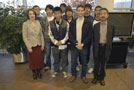 Japanese visitors pose for a group photo in the SASC lobby