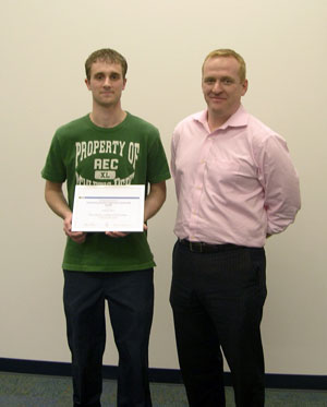 Joshua M. Yost with John Harris, public relations manager for CCC Information Services Inc.