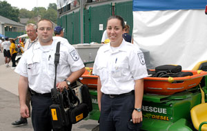 Penn College Paramedic students Shawn T. Ritchey (left) and Jamie R. Izer stand ready at the Little League World Series.