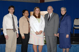 From left, Steven A. Romano, Peggy Madigan Memorial Leadership Scholarship recipient for 2005%3B Jennifer C. Berrios and  Andrea L. Hetner, Peggy Madigan Memorial Leadership Scholarship recipients for 2006%3B Sen. Roger A. Madigan%3B and Penn College President Davie Jane Gilmour.