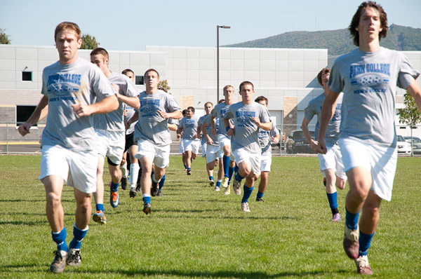 The Wildcat men's soccer team warms up for its game against Penn State York.
