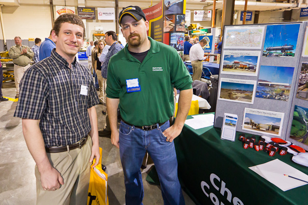 Alumnus and former Penn College faculty member Paul A. Zenga (right), who has hired seven graduates for his latest employer, obliges a photo op with student Brett R. Potteiger at the Dalrymple/Chemung Contracting display. Potteiger, of Wernersville, earned a degree in diesel technology in 2010 and anticipates spring graduation in technology management.