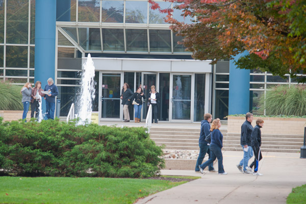 Guests enjoy autumn strolls and sights on campus.