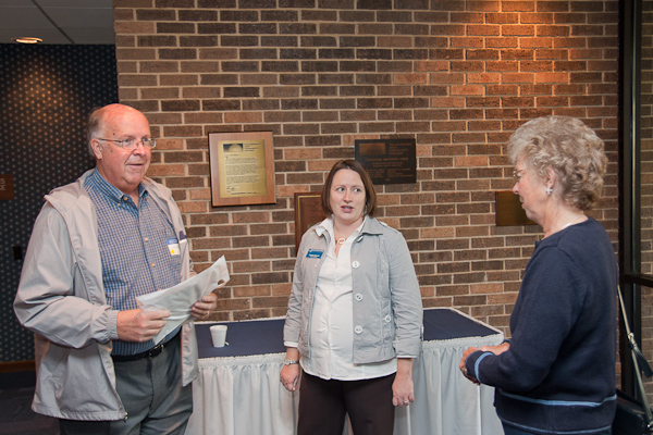 Valerie L. Fessler, director of alumni relations, talks with Dale A. Metzker, a 2002 Penn College faculty retiree (who also taught at Williamsport Area Community College and W.T.I.), and his wife, Sally.