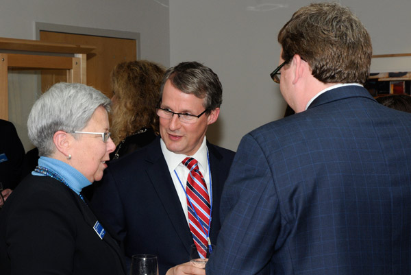 Steven Tyrell, vice president of student affairs, Alfred State College, center, chats with President Davie Jane Gilmour and Elliott Strickland Jr., chief student affairs officer.