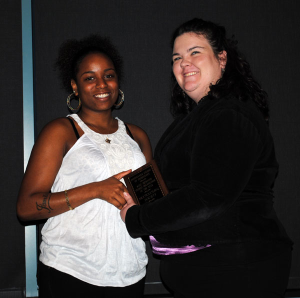 ... after the group (represented by Tanica S. Billey) was honored by Sara R. Hillis, assistant director of student activities for student services and involvement, as Most Improved Student Organization