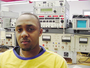 Mwaura K. Ngoima, Penn College's first international student to be certified as an aircraft electronics technician, at the Lumley Aviation Center. 