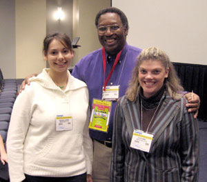 Penn College students Michaela A. Lehman, left, and Alicia L. Bobst, both of Montoursville, meet with Thomas Moore, a conference speaker who taught them how to incorporate music into the teaching of young children.