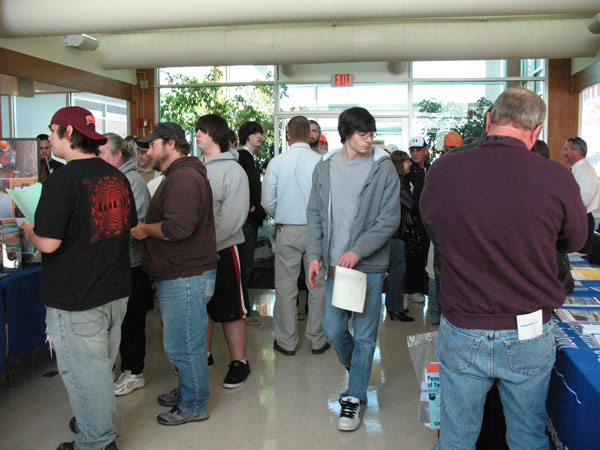 Drawn by unique programs and shuttle-bus service, visitors fill the Earth Science Center lobby.