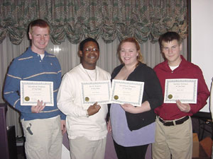 Presented with ' . . . of the Year' honors were, from left, G. Patrick Butler, Abiel B. Harry, Erin E. Scott, and Nathaniel L. Baum.