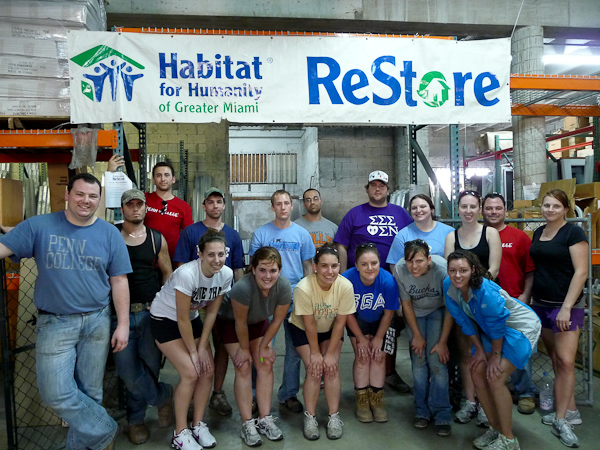 The group gathers at the Habitat ReStore.