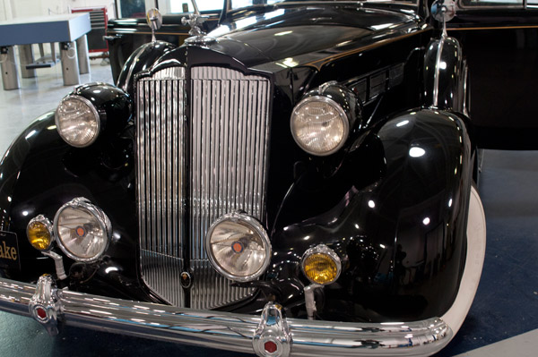 ... while a temporary loan of a 1937 Packard from a member of the Antique Automobile Club of America  a former parade vehicle for New York City Mayor Fiorello LaGuardia  previews the caliber of classic car that might well come through the collision repair lab.