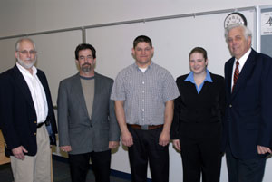 From left, Richard L. Fenstamaker, chairman of the Williamsport Parking Authority%3B Penn College civil engineering technology students David P. Schneider, William R. Bolt and Morgan L. Etters%3B and Joseph Laver Jr., secretary of the Parking Authority.