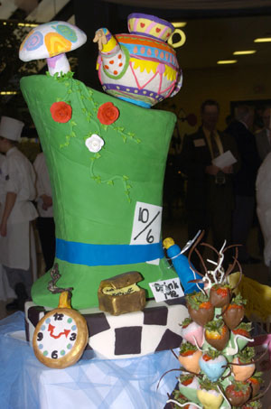 Baking and pastry arts students created a giant cake replicating the Mad Hatter's top hat to serve as a centerpiece for the 'Alice in Wonderland'- themed Grand Pastry Buffet and Scholarship Reception.