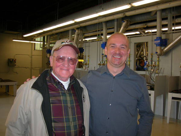 Paul Schriner 63 (welding alum and retiree) reunites with one of his former students, Robert Blauser, a 2000 welding graduate and 2009 recipient of the college's Alumni Achievement Award. 